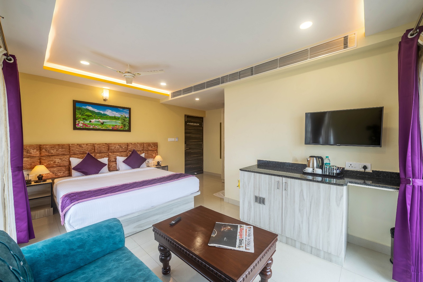 Luxury Room at Zenith Suites with king bed and premium furnishings